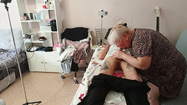 Stepmom gives amazing deep throat blowjob and swallows cum on massage table